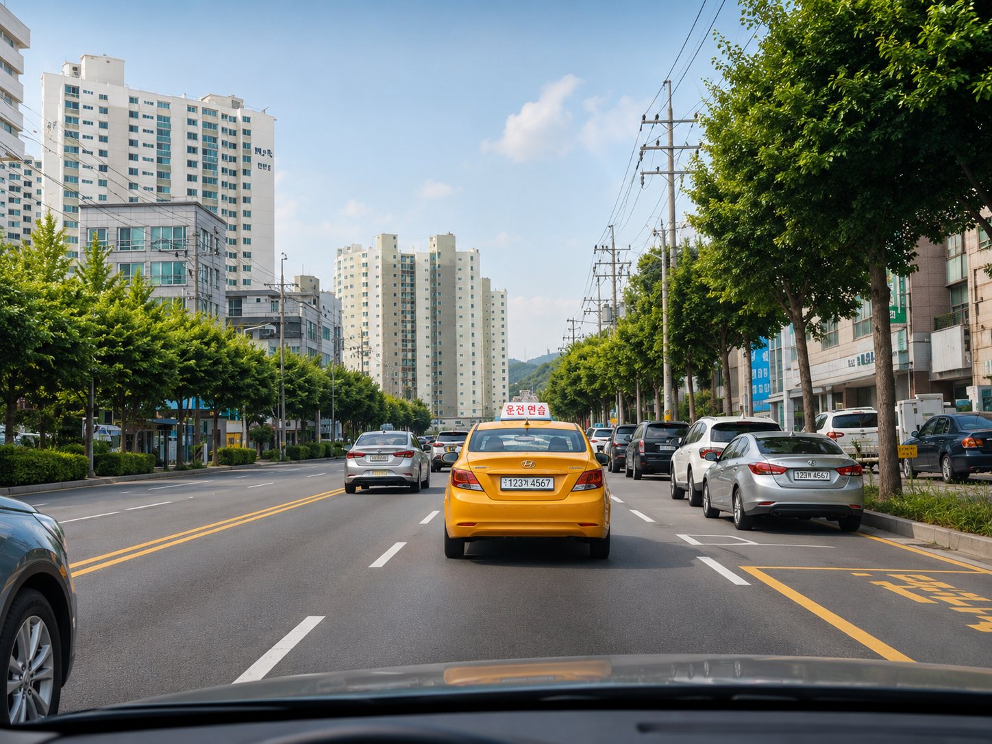 Practising right-side driving in a left-hand-drive car on Korean roads